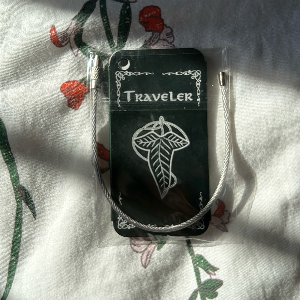 OwlCrate metal luggage tag